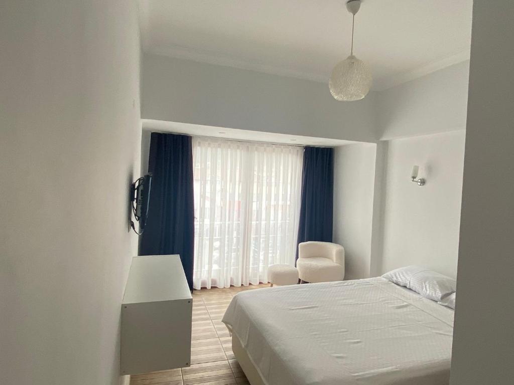 Postel nebo postele na pokoji v ubytování Bouvardia Inn