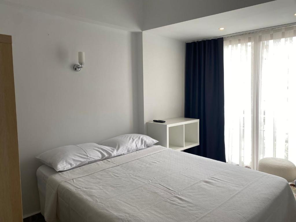 Postel nebo postele na pokoji v ubytování Bouvardia Inn