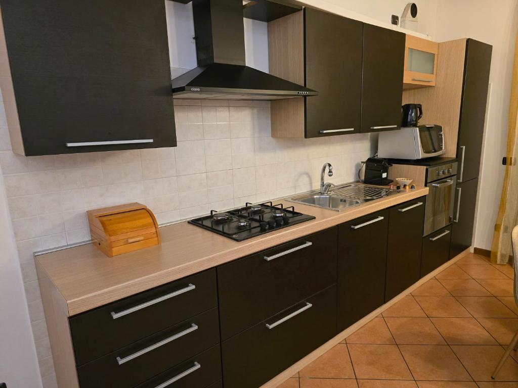 Kuchyň nebo kuchyňský kout v ubytování Aurora's Home