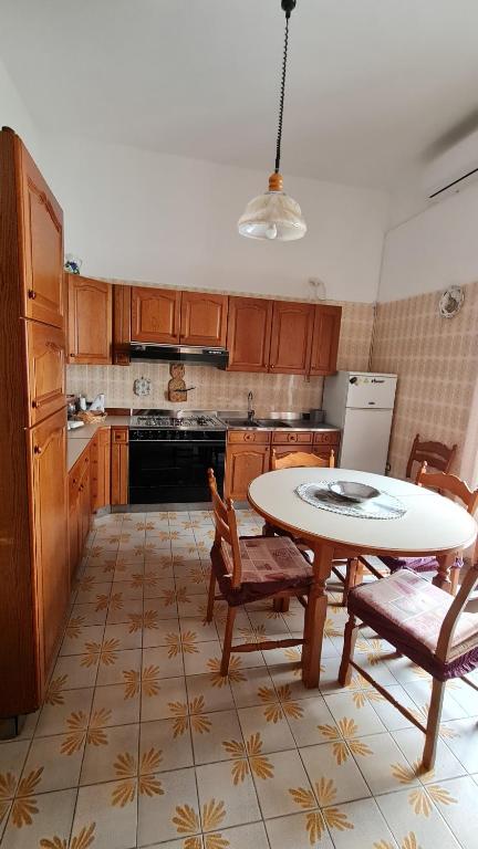 Kuchyň nebo kuchyňský kout v ubytování Casa Vacanze Nonna Tetta