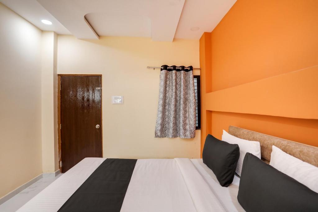 Postel nebo postele na pokoji v ubytování Hotel O Sky View Stay In