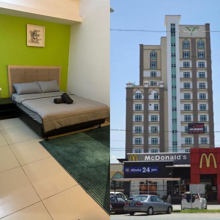 Postel nebo postele na pokoji v ubytování De Viana Apartment Homestay Wakaf Che Yeh