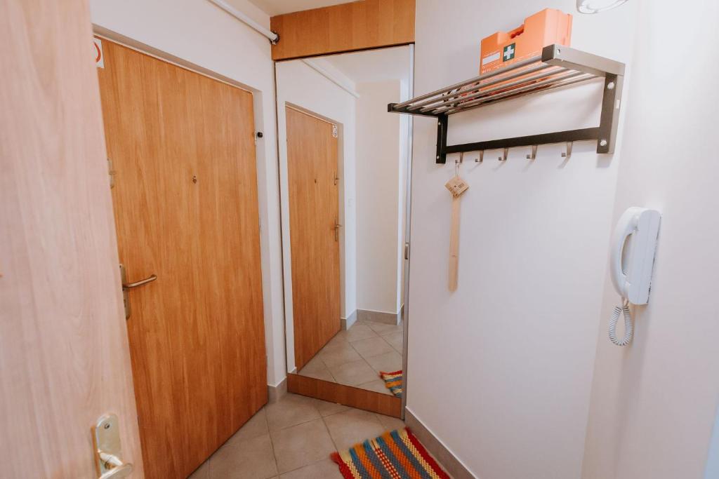 Posteľ alebo postele v izbe v ubytovaní Apartament Milbertus
