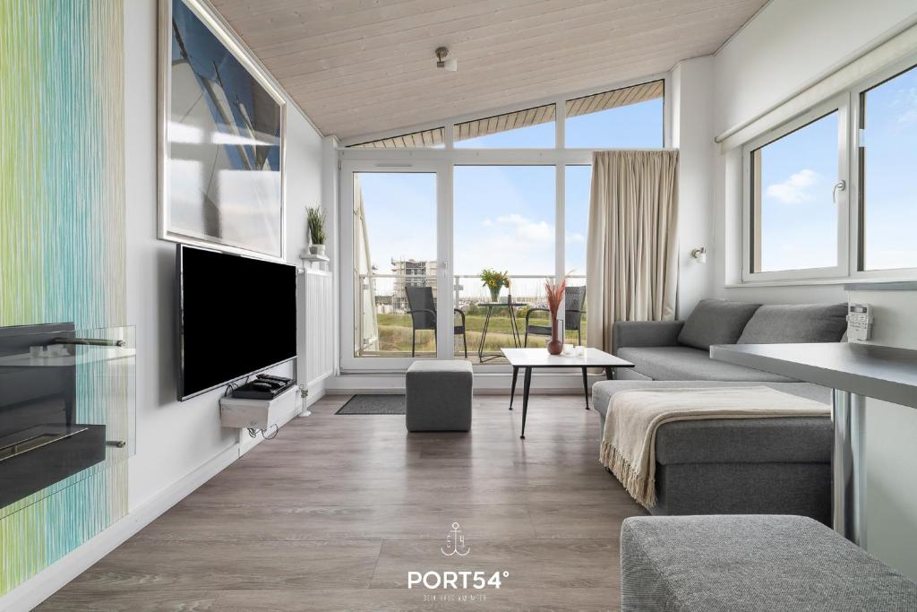 Et tv og/eller underholdning på Ferienhaus Sonnenblume Marina Wendtorf