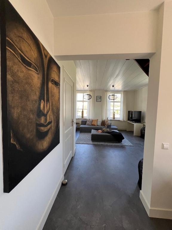 Postel nebo postele na pokoji v ubytování Rhynhoven Lodge