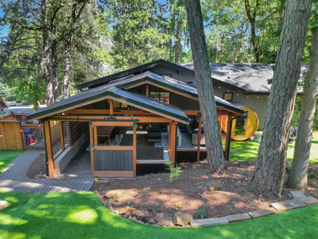 a house with a gazebo in a yard at Eugene Evergreen Escape By Leschaletsstays in Eugene