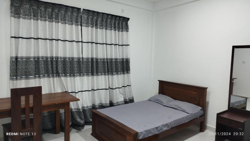 Postel nebo postele na pokoji v ubytování Mihitha Resort