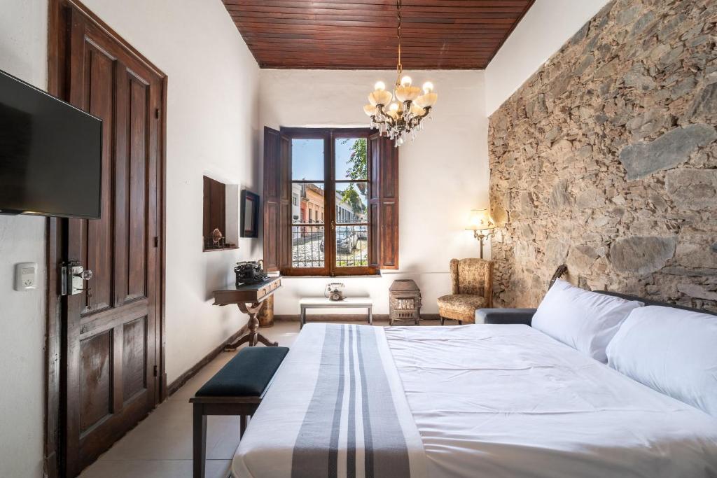 En eller flere senge i et værelse på Casa en el Casco Historico con Vista al Rio