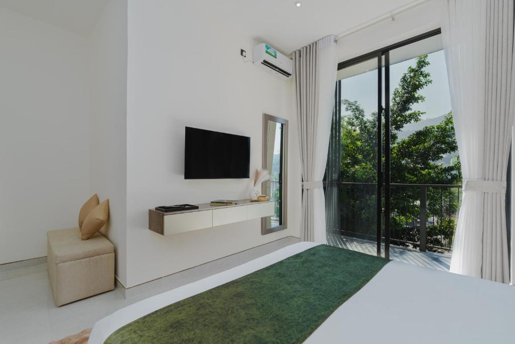 TV a/nebo společenská místnost v ubytování Orbit88 Hotel by AMR