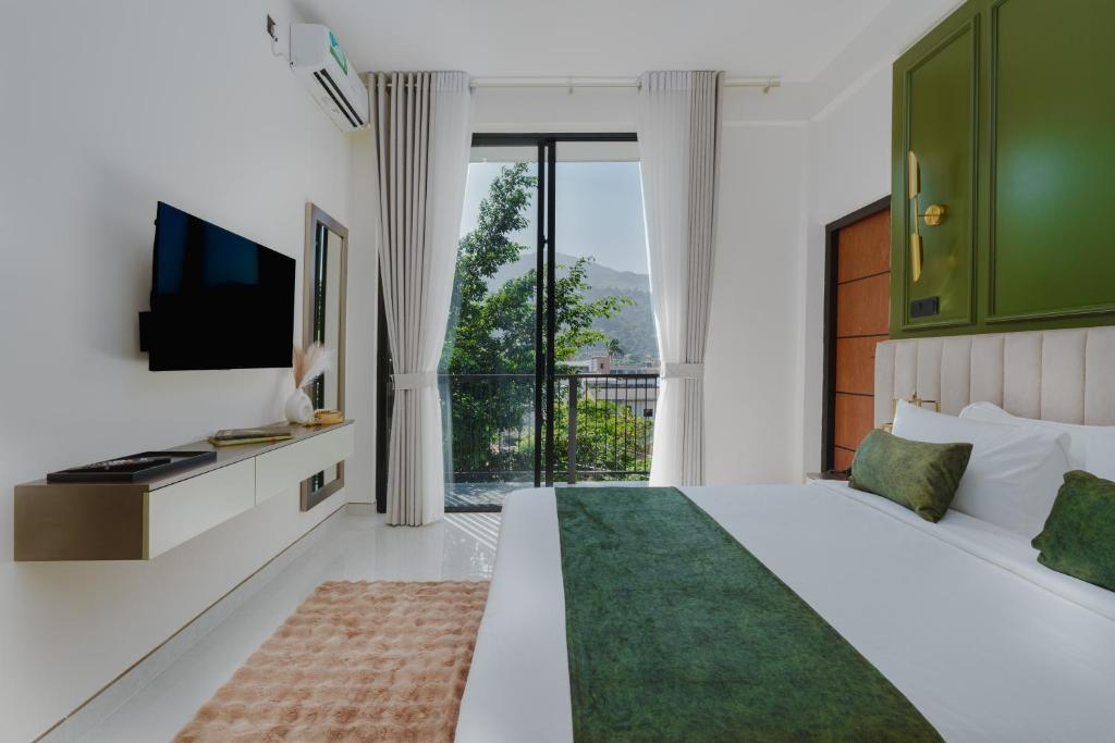 TV a/nebo společenská místnost v ubytování Orbit88 Hotel by AMR