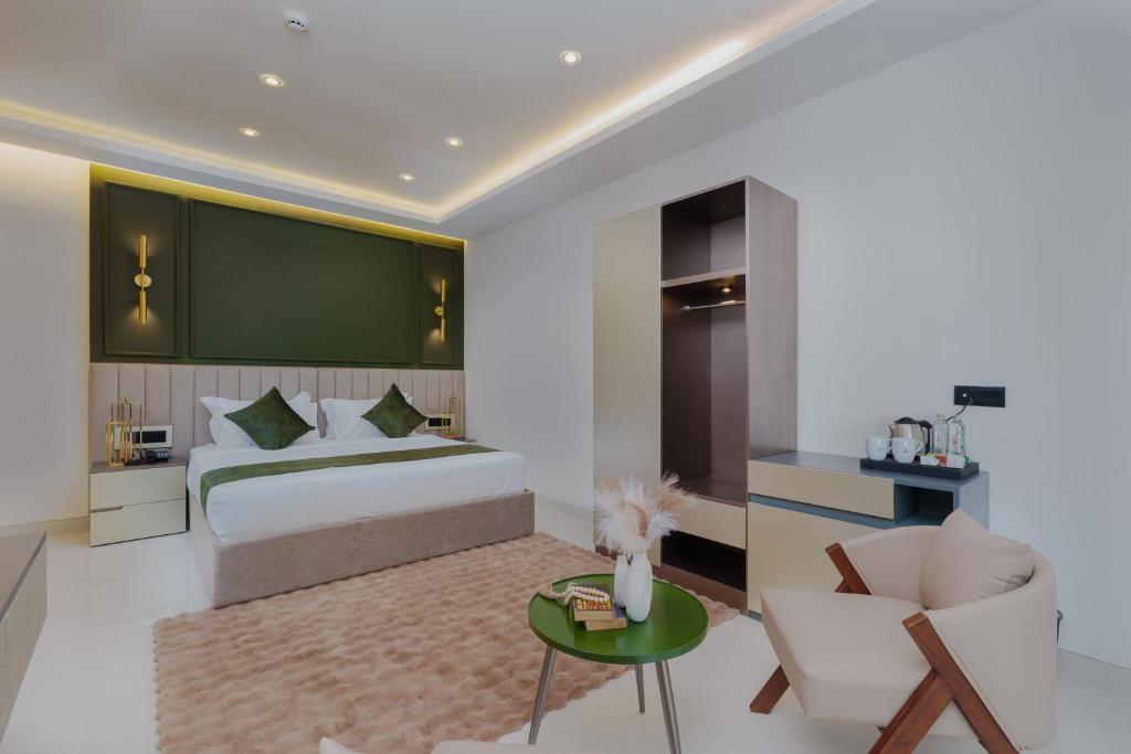 Postel nebo postele na pokoji v ubytování Orbit88 Hotel by AMR