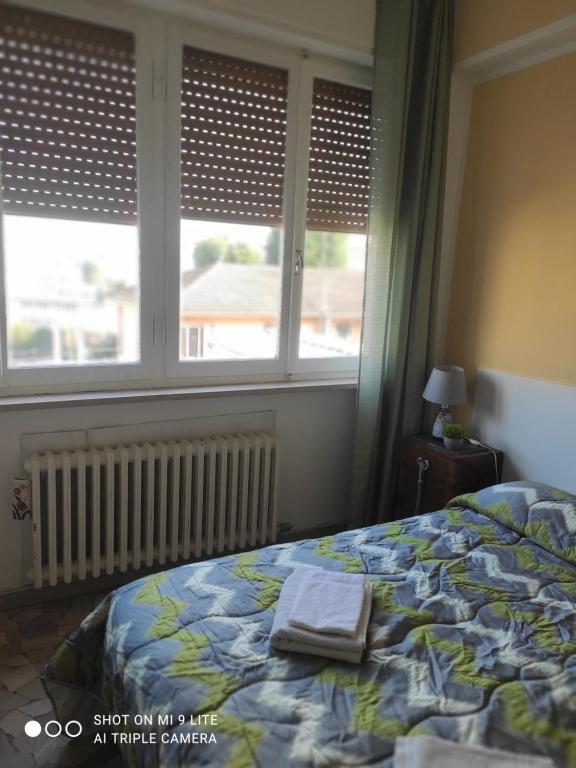 Postel nebo postele na pokoji v ubytování Casa di Ana