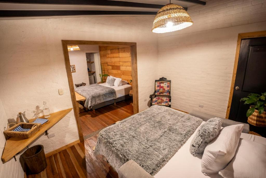 Postel nebo postele na pokoji v ubytování La Herradura lodge