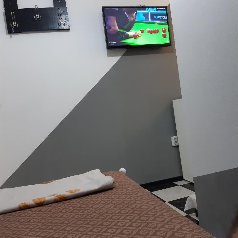 TV a/nebo společenská místnost v ubytování B&B Duo Caffe