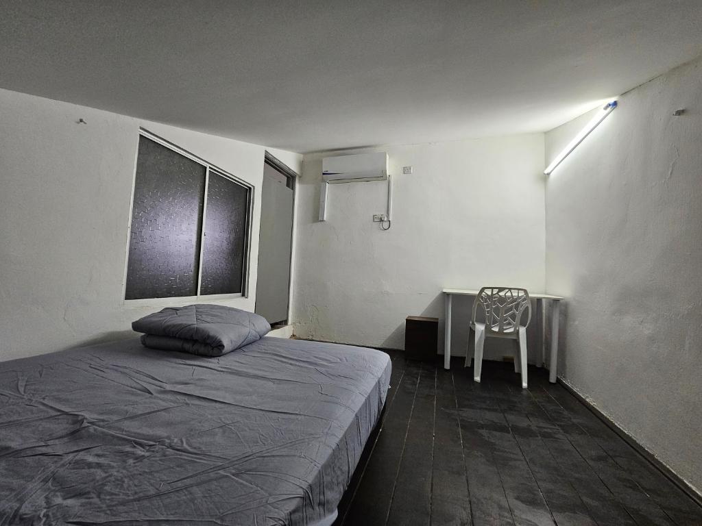 Postel nebo postele na pokoji v ubytování Rain Forest Hostel