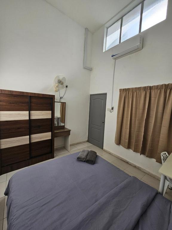 Postel nebo postele na pokoji v ubytování Rain Forest Hostel