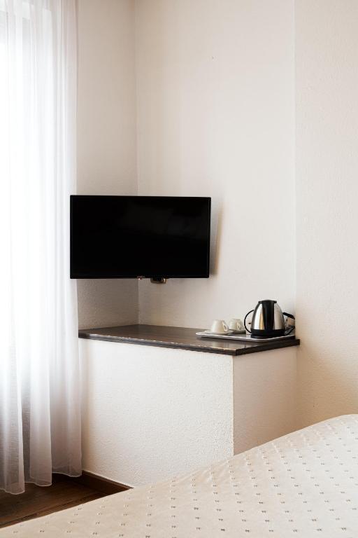 TV a/nebo společenská místnost v ubytování Hotel Sonenga