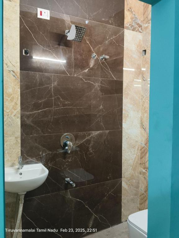 Koupelna v ubytování Rudhraksh Comfort Stay