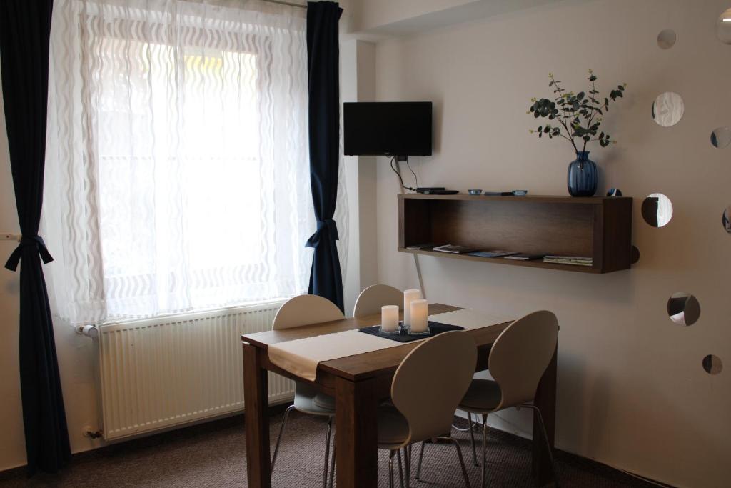 TV a/nebo společenská místnost v ubytování Jáchymov Blue Apartment