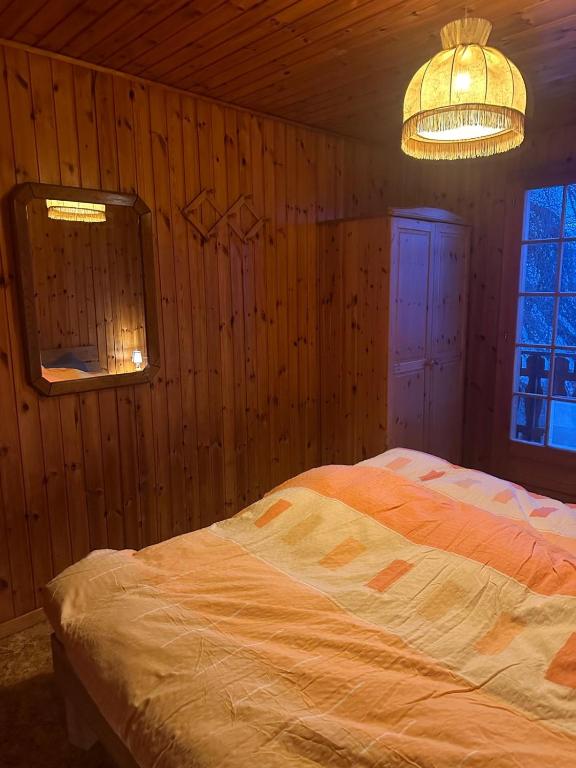 Postel nebo postele na pokoji v ubytování Les Rhodos