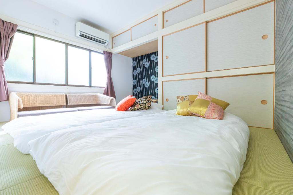 Zen Home AKABANEにあるベッド