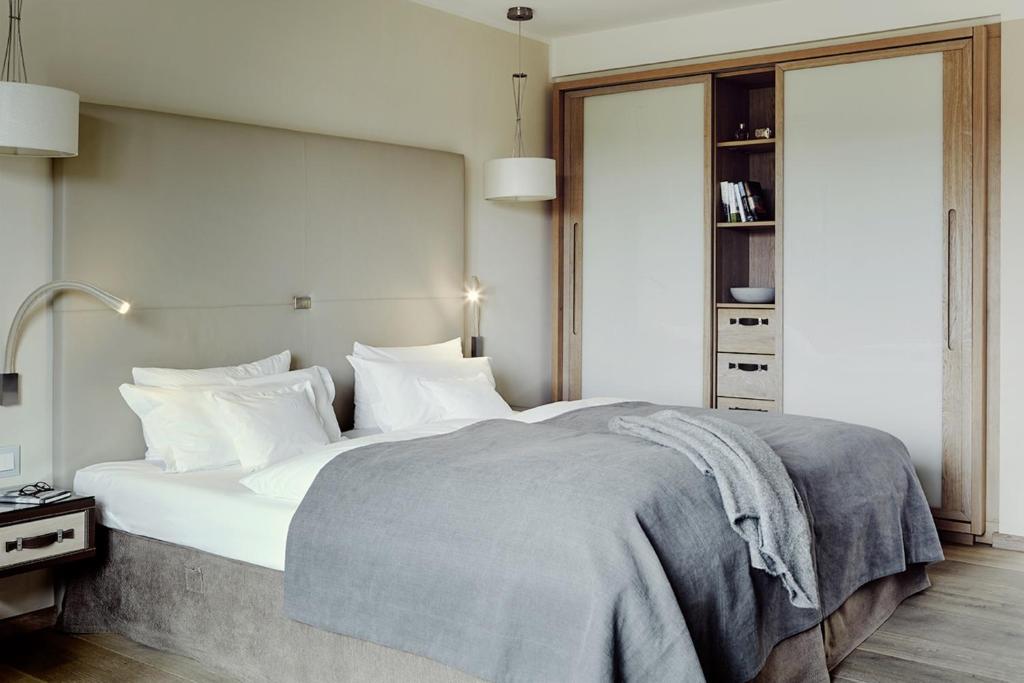 Postel nebo postele na pokoji v ubytování Hotel Fährhaus