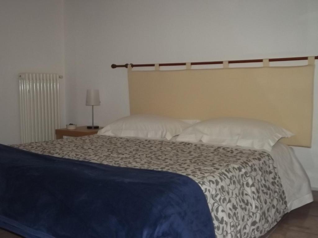 Postel nebo postele na pokoji v ubytování La Specchia
