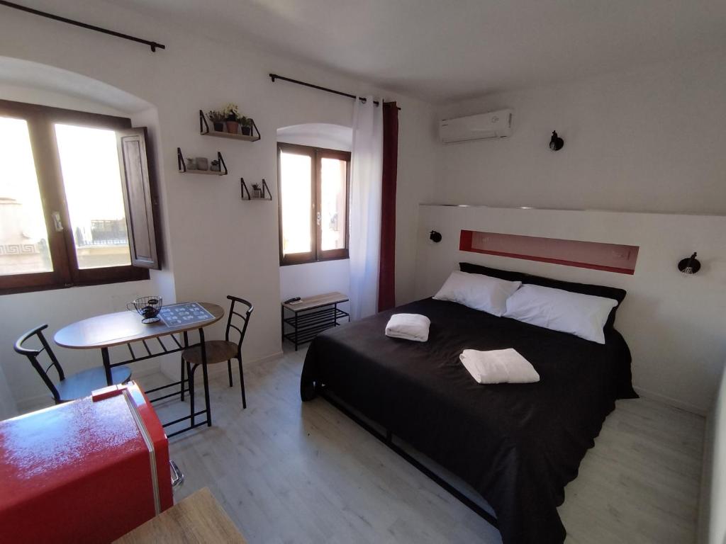 Postel nebo postele na pokoji v ubytování B&B gli Ombrellini