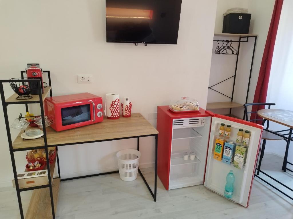 Kuchyň nebo kuchyňský kout v ubytování B&B gli Ombrellini