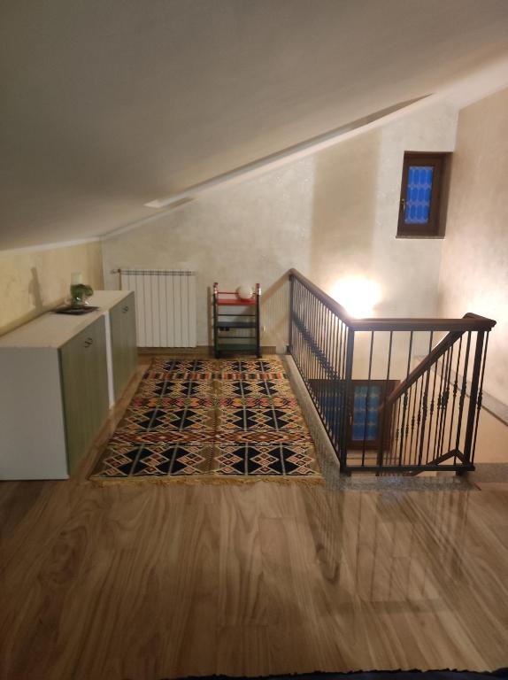 Postel nebo postele na pokoji v ubytování Spazioso appartamento su due piani