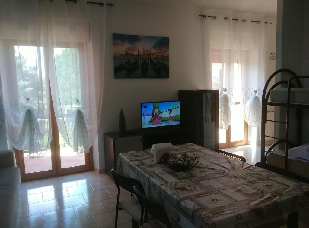 TV a/nebo společenská místnost v ubytování Villa Elena