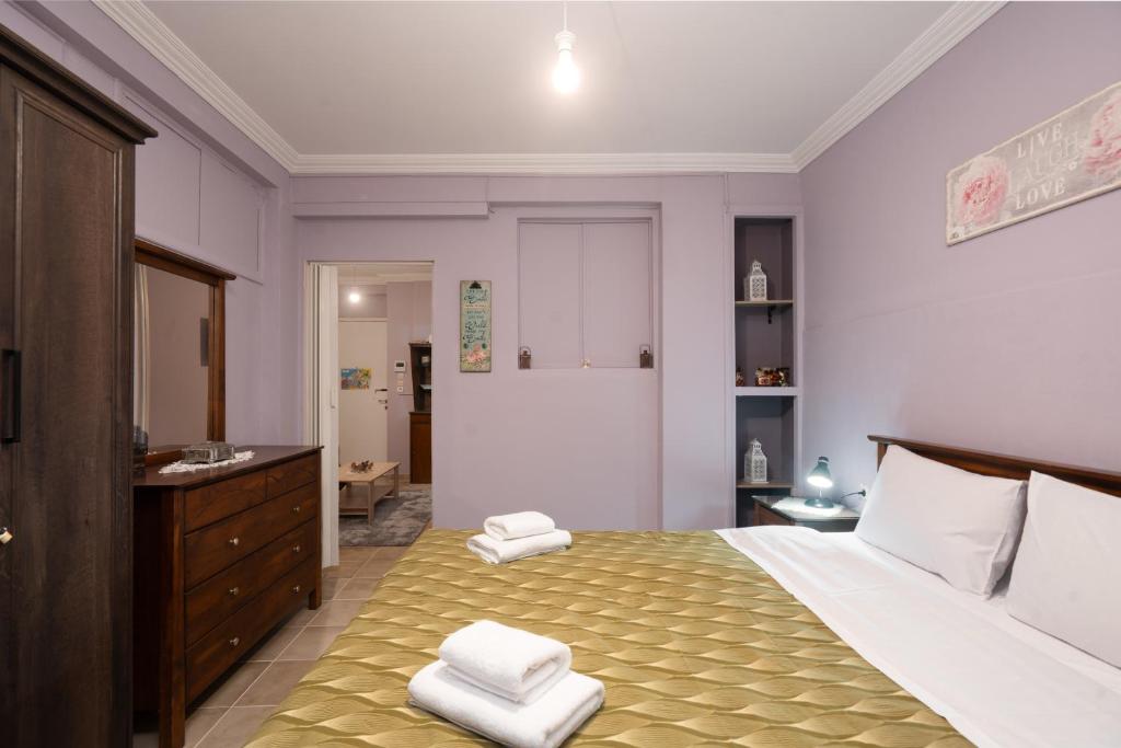 Posteľ alebo postele v izbe v ubytovaní The Sweetest Acropolis Flat
