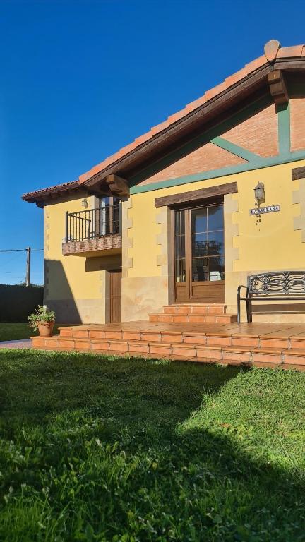 a house with a deck and a balcony on it at La Solana in Ancillo