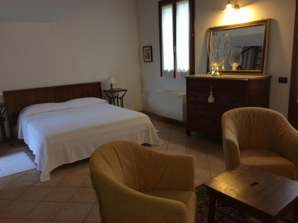 Postel nebo postele na pokoji v ubytování Relais Varnello