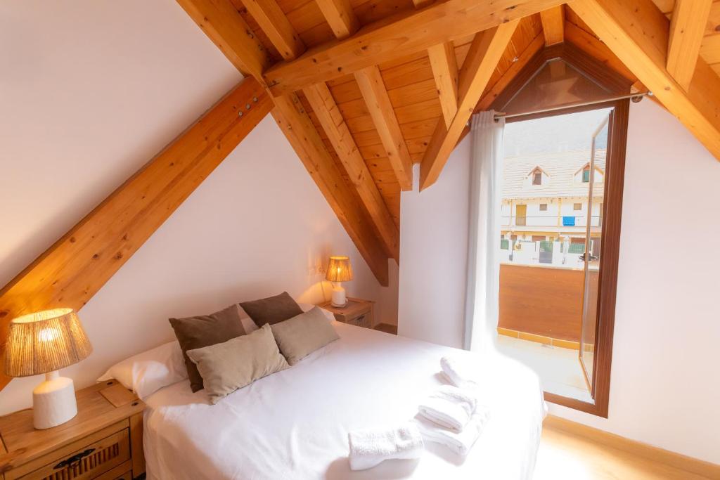 Posteľ alebo postele v izbe v ubytovaní Duplex El Refugio de La Bolera