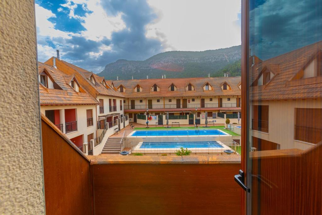 Bazén v ubytovaní Duplex El Refugio de La Bolera alebo v jeho blízkosti