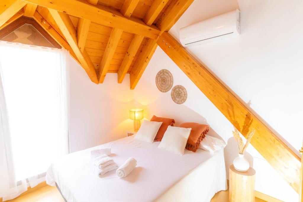 Posteľ alebo postele v izbe v ubytovaní Duplex El Refugio de La Bolera