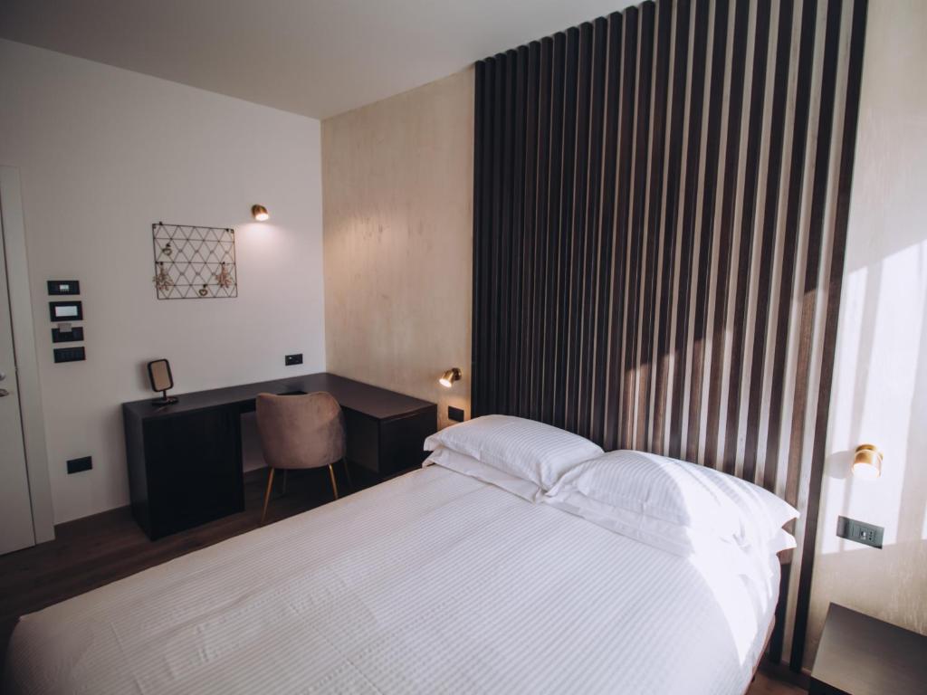 Postel nebo postele na pokoji v ubytování SambuRoom B&B