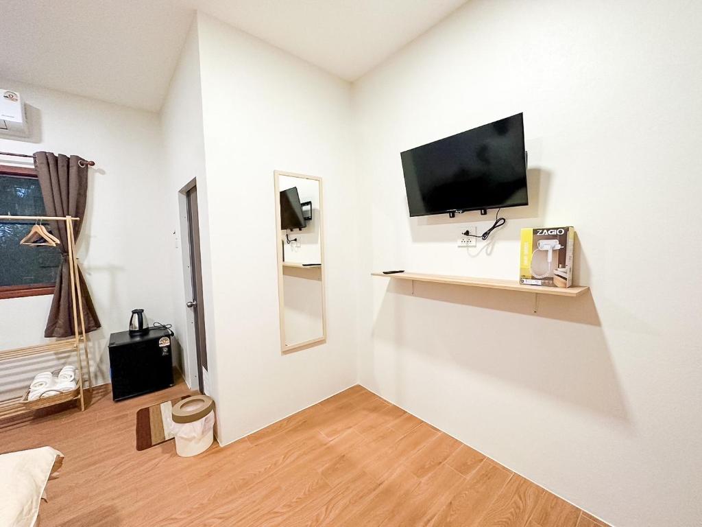 TV a/nebo společenská místnost v ubytování Nakai Resort Sakon Nakhon