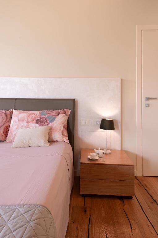 Postel nebo postele na pokoji v ubytování B&B Casa Pralunghi