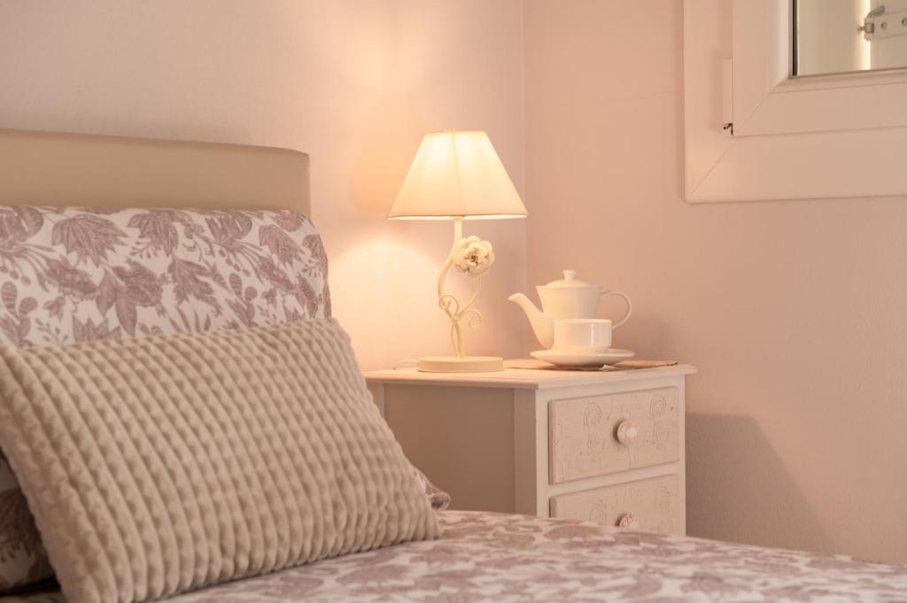 Postel nebo postele na pokoji v ubytování B&B Casa Pralunghi