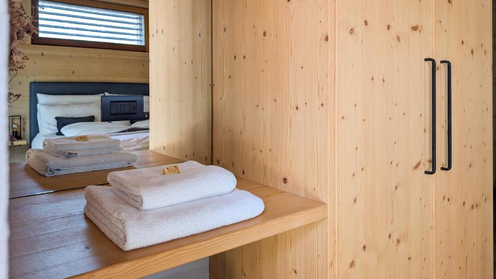 Posteľ alebo postele v izbe v ubytovaní Nix & Nivis Chalet
