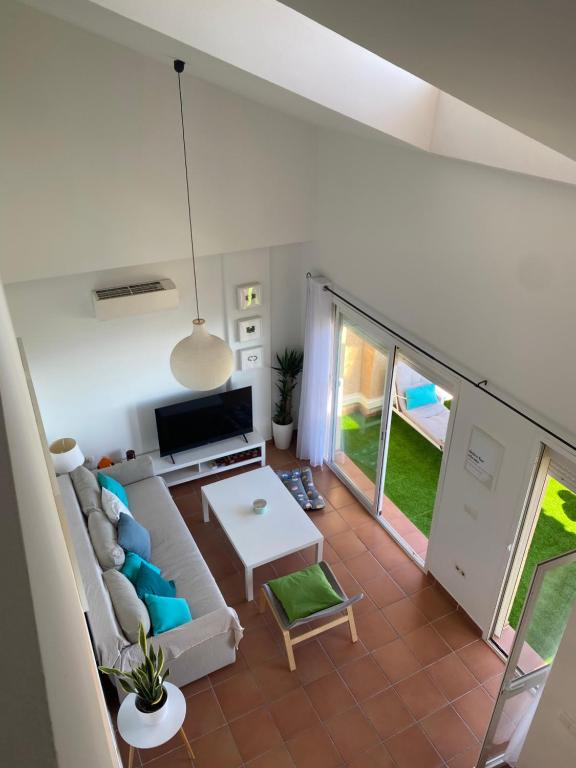 Posezení v ubytování Bohemian Penthouse in Alcaidesa