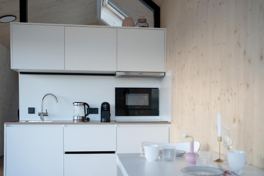 Kuchyň nebo kuchyňský kout v ubytování Tiny House im Allgäu