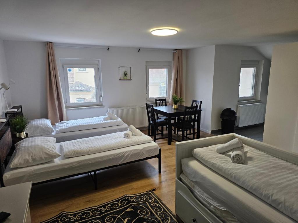 Postel nebo postele na pokoji v ubytování Aparthotel Horn Bahnstrasse