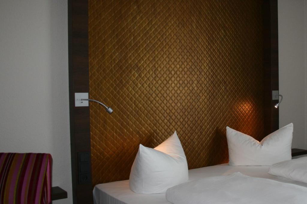 Postel nebo postele na pokoji v ubytování HOTEL PARQÉO im A66