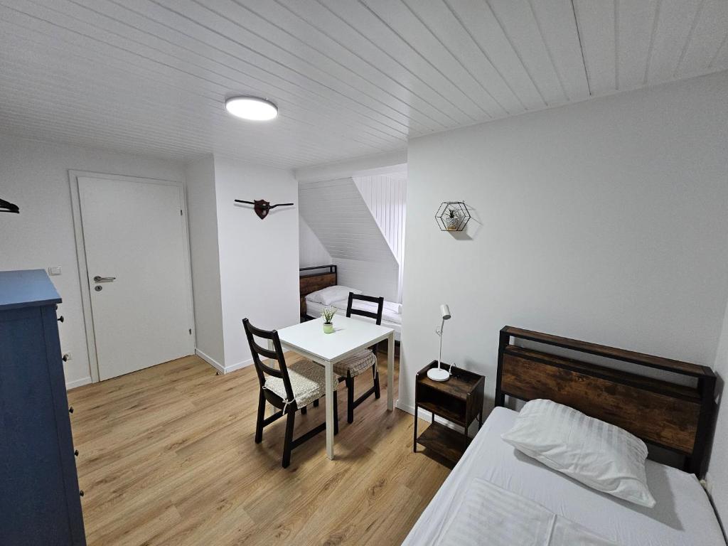 Postel nebo postele na pokoji v ubytování Aparthotel Horn Bahnstrasse