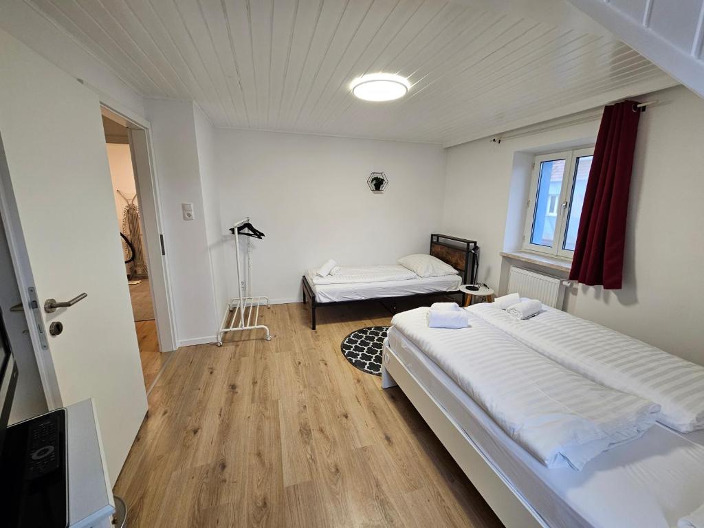 Postel nebo postele na pokoji v ubytování Aparthotel Horn Bahnstrasse