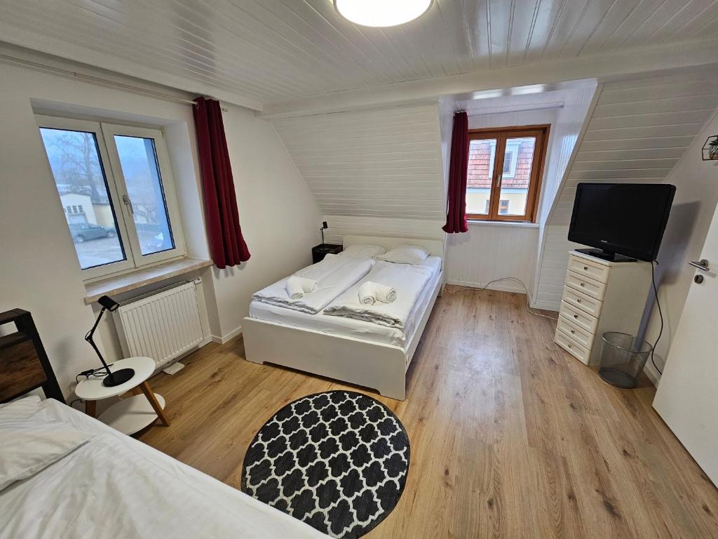 Postel nebo postele na pokoji v ubytování Aparthotel Horn Bahnstrasse