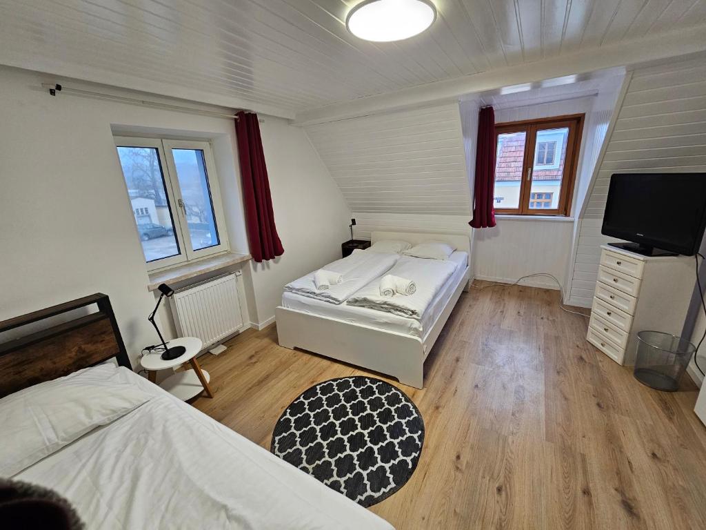 Postel nebo postele na pokoji v ubytování Aparthotel Horn Bahnstrasse